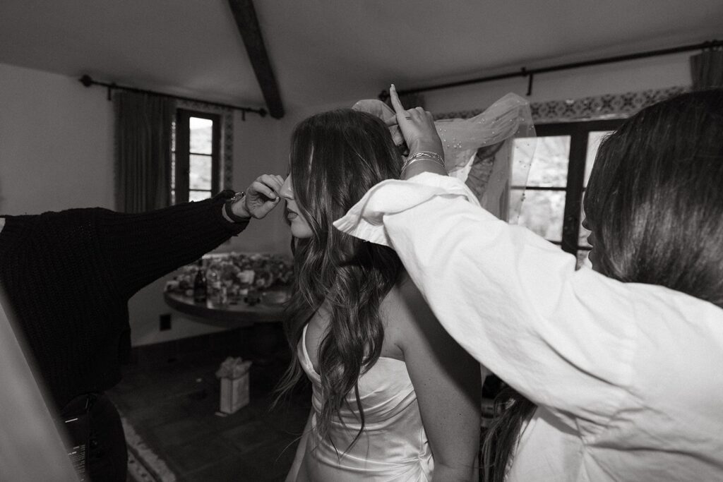 Bride getting ready on wedding day Photographed by Nicole Kirshner