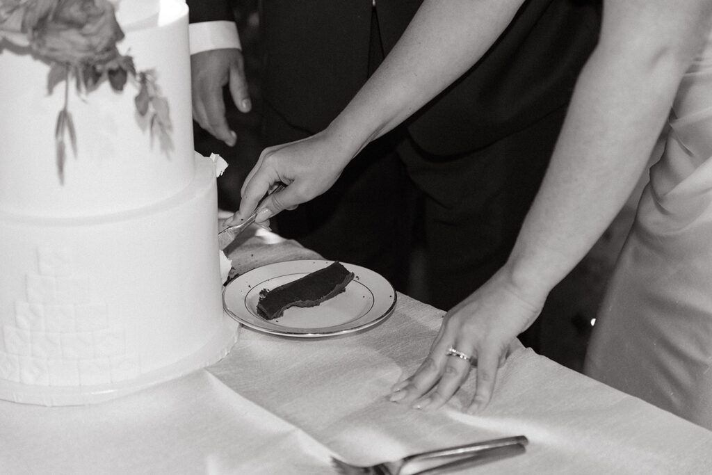 Cake cutting at Hummingbird Nest Ranch Wedding Photographed by Nicole Kirshner